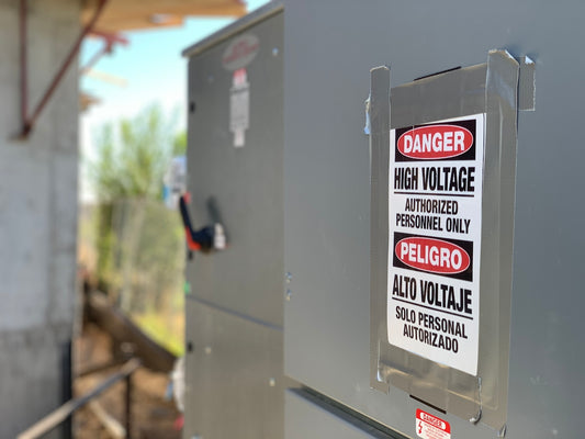 a close up of a metal box with a sign on it
