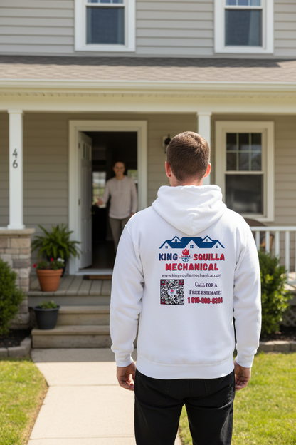 HVAC Technician wearing King Squilla Mechanical white hoodie back view at front door from sidewalk